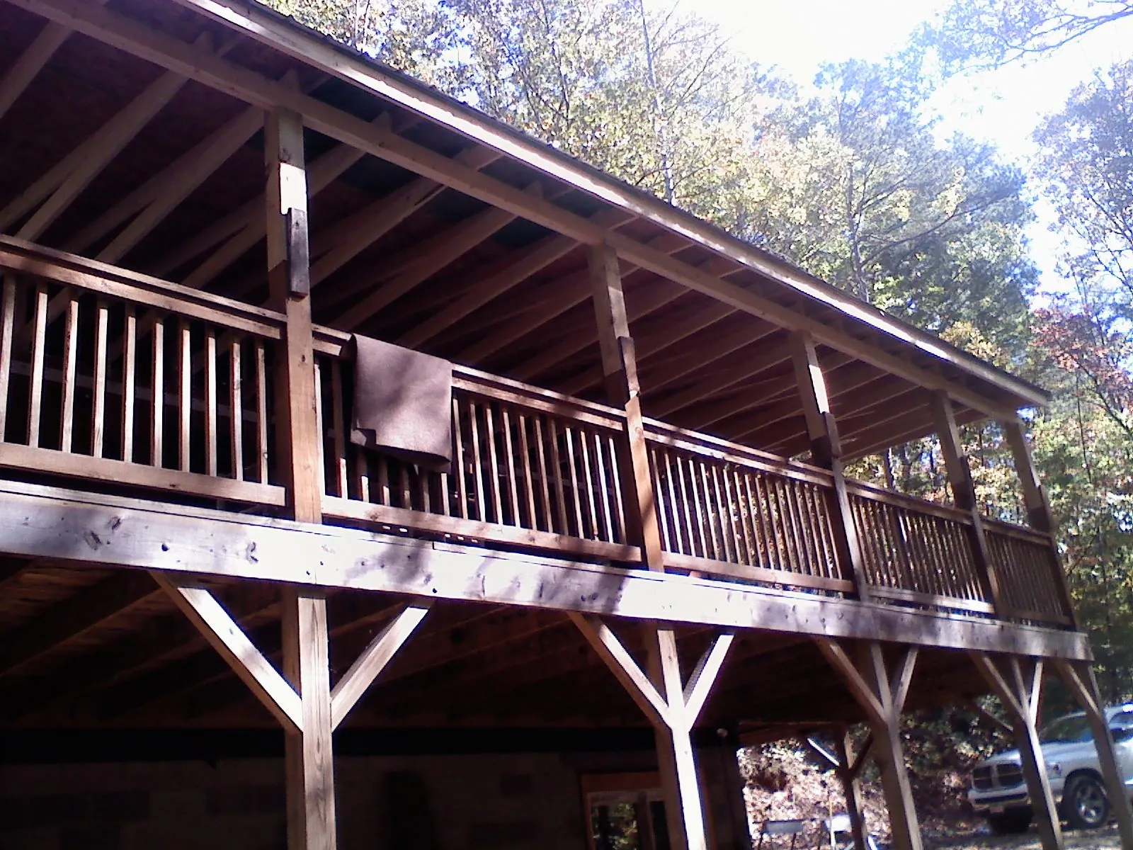 Timber framing under a new elevated porch and deck — Roof Leak Repair in Lacombe by Roofing Brothers